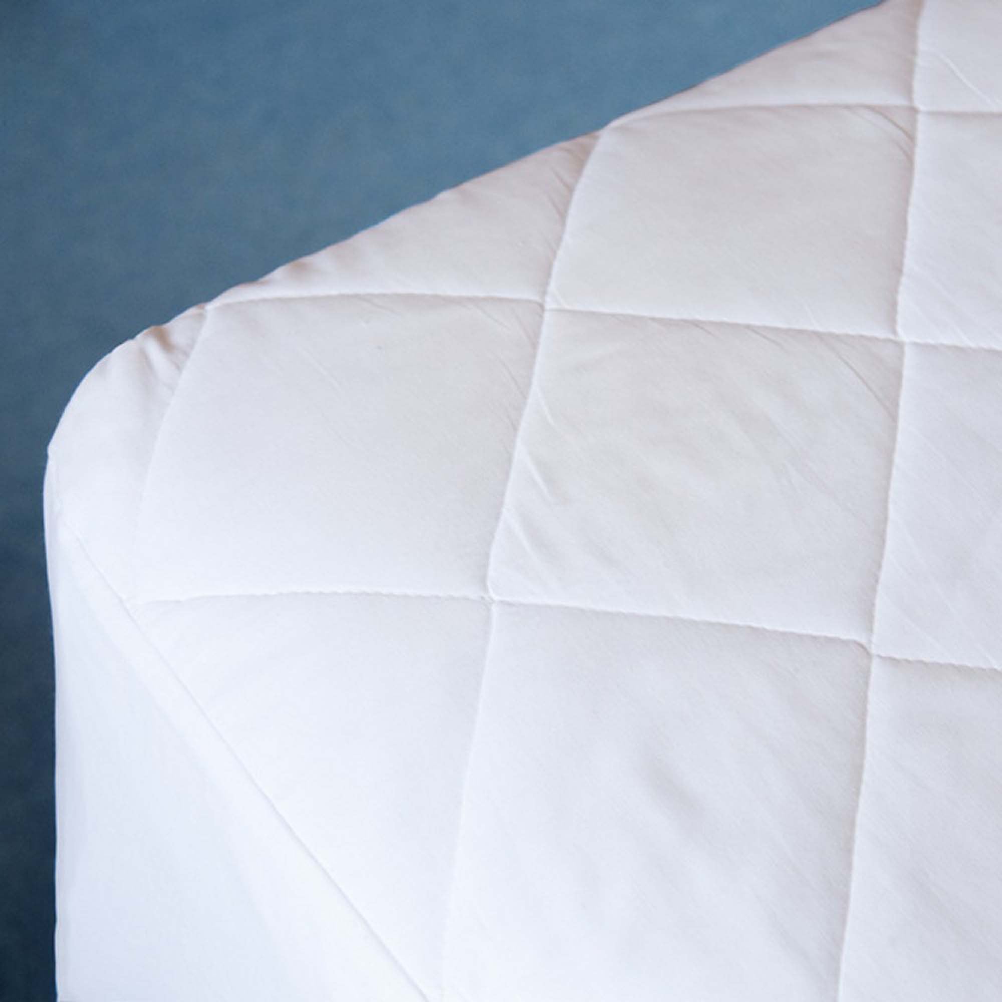 Luxury quilted cotton mattress protector for a university bed